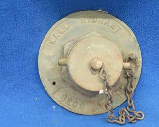 Lot 132. Brass wall hydrant cover