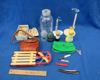 Lot 350. Many collectibles including a handmade alligator skin purse, baby shoes, an old straight edge, and more