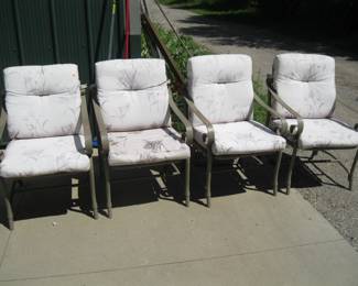 Lot 424. Four matching patio chairs
