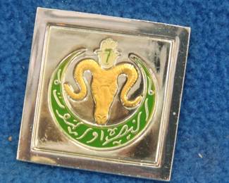 Lot 150. Franklin Mint's sterling silver The Algerian Rifles France ingot from "The World's Greatest Regiments" weighing 14.79 grams.. All 50 emblems and the wooden display case will be sold separately in this auction