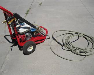 Lot 402. North Star gas-powered pressure washer. Has a Honda GX 160 motor with compression. Includes hose, 5 nozzles, gun, and soap pick-up line.
