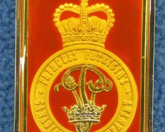 Lot 59. Franklin Mint's sterling silver Princess Patricia's Canadian Light Infantry ingot from "The World's Greatest Regiments" weighing 24.05 grams.. All 50 emblems and the wooden display case will be sold separately in this auction