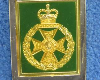 Lot 107. Franklin Mint's sterling silver The Royal green-Jackets United Kingdom ingot from "The World's Greatest Regiments" weighing 23.46 grams.. All 50 emblems and the wooden display case will be sold separately in this auction