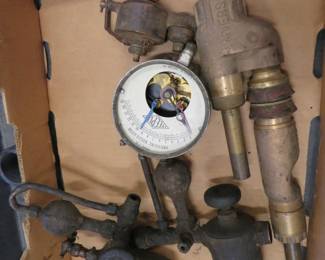 Lot 142. Pressure gauge, large brass fitting and unknown items