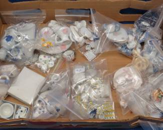 Lot 348. Many miniature tea sets