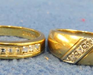 Lot 269. Woman's ring size 7 3/4 marked 18X GEA. Men's ring size 8 not marked