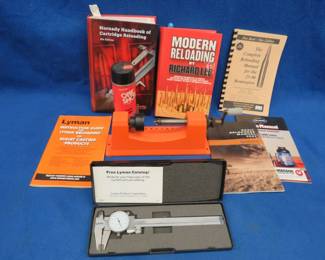 Lot 189. Lyman case trimmer, Lyman 6" stainless calipers, case lube, and reloading manuals