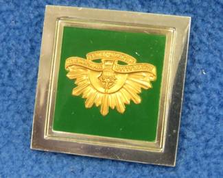 Lot 58. Franklin Mint's sterling silver Australian Imperial Forces Australia ingot from "The World's Greatest Regiments" weighing 14.46 grams.. All 50 emblems and the wooden display case will be sold separately in this auction