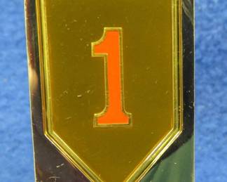 Lot 203. Franklin Mint's sterling silver 1st Infantry Division U.S.A. ingot from "The World's Greatest Regiments" weighing 23.58 grams.. All 50 emblems and the wooden display case will be sold separately in this auction
