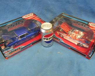 Lot 78. Two Maisto Pro Rodz 1:24 die cast cars: 1968 Chevy Camaro. 1965 Chevy Malibu "SS"
