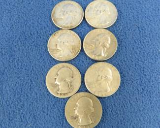 Lot 304. Seven silver quarters