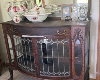ANTIQUE LEADED GLASS HUTCH, SOME GLASS DAMAGE FROM TORNADO