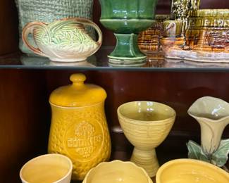 Tons of McCoy pottery , Roseville pottery , Hull pottery , Shawnee Pottery