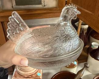 hen on a nest glass