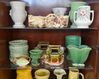 Tons of McCoy pottery , Roseville pottery , Hull pottery , Shawnee Pottery 