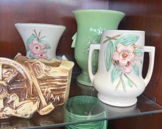 Tons of McCoy pottery , Roseville pottery , Hull pottery , Shawnee Pottery