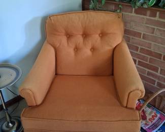 Very sturdy orange chair with ample size seating.