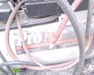 Air compressor. Used a few tmes works well.
