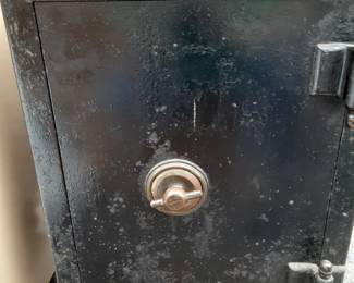 We have an antique bankers safe . It has 3 wooden wheels still . It has gotten a little rusty lately, but could clean up well.