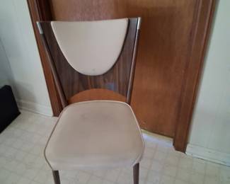 This is theone of the 2 chairs that originally came with the previous table . There are 2 of these in good condition and are being sold separtely form the table . If you know a good welder you can have the other 2 that go with it for free if you want. They have naugahyde seats that are comfortable and wipeable.