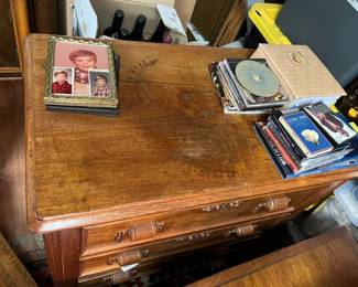 Vintage wood dresser or console table with natural finish and carved drawer pulls