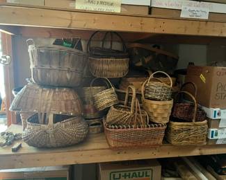 Basket shelf in garage some are quite old and uniquely shaped