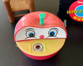 Vintage Yone mechanical tin litho apple coin bank with wind up mechanism