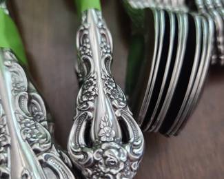 4 sets of flatware - different patterns