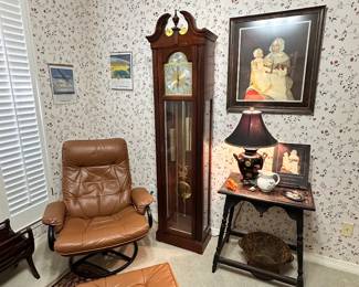 Leather: Swivel Recliner and Ottoman, Howard Miller Grandfather Clock, Antique Parlor Table with Carved Top