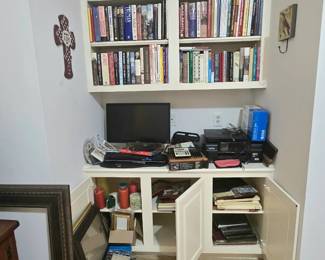 hardback books and picture frames