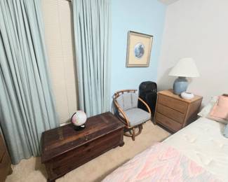 cedar chest and ratan swivel chair