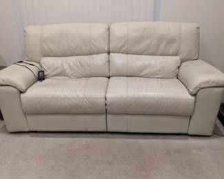 Leather couch. Electric recliner.
