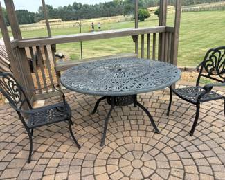 . . . beautiful wrought-iron table and chairs