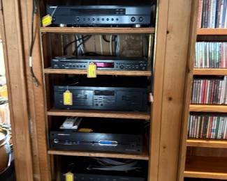 Bang & Olufsen (B&O), Denon Pro, Adcom, and Panamax, including amplifiers, receivers, speakers, turntables, cassette decks, CD players, subwoofers, and audio accessories.