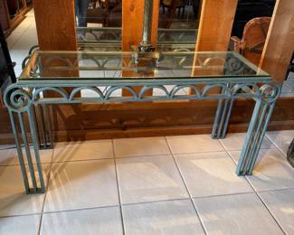 Metal and Glass console table matches cofee table by leather sectional