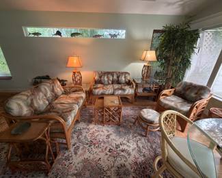 Twin Ratan and uplostered Loved Seats, armchair, nesting table, side tables ratan lamps