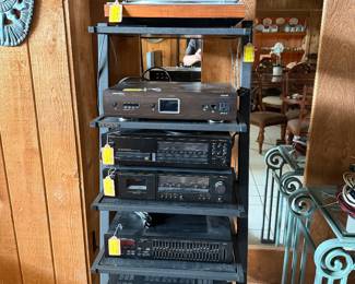 Bang & Olufsen (B&O), Denon Pro, Adcom, and Panamax, including amplifiers, receivers, speakers, turntables, cassette decks, CD players, subwoofers, and audio accessories.