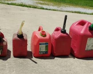 Set Of Five Various Size Gas Cans