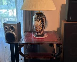 Traditional Wood End Table  Elegant dark wood end table featuring a glossy finish, curved legs, decorative carved details, and a lower shelf for extra storage or display. A great accent piece for a living room, bedroom, hallway, or entryway.