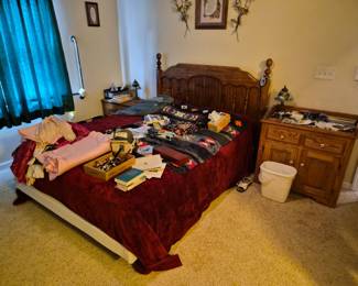 bed and vintage clothing