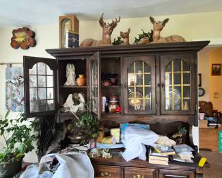 Ceramic figures and China cabinet