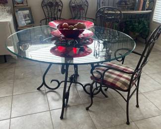 WROUGHT IRON TABLE AND 6 CHAIRS