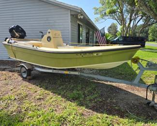 14' EXUMA SNOOKAHOLIC CLASSIC SKIFF ADYO1404D223 with Magic Tilt Trailer & SUZUKI Motor Featured in 2023 Sarasota Florida Boat Show. Stereo System, GPS System, Live Well, Fishing Holders, Custom Made Bimini Top ($2000), Stick It Anchor System, Upgraded Battery. Low Hours.