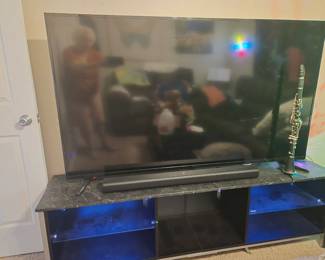 TV/Sideboard with faux marble top & 70" Smart TV with Fire Stick too. Clarinet