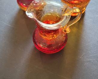 Four piece hand blown crackle glass made in the Amberina Colorway