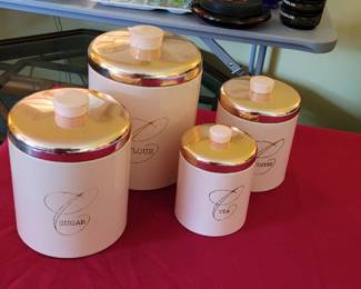 Four piece metal kitchen canister set by Ransburg