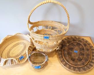 2 Charleston sweetgrass baskets and other wicker/rattan.