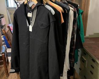 Vintage U.S. Navy sailor uniform and assorted clothing.