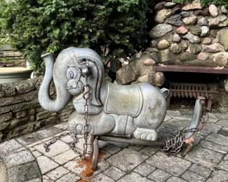 Vintage cast-metal spring rider elephant playground ride—wonderful garden art!