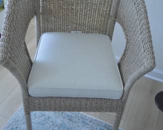 Weathered rattan woven chair